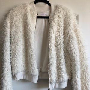 Whit furry jacket